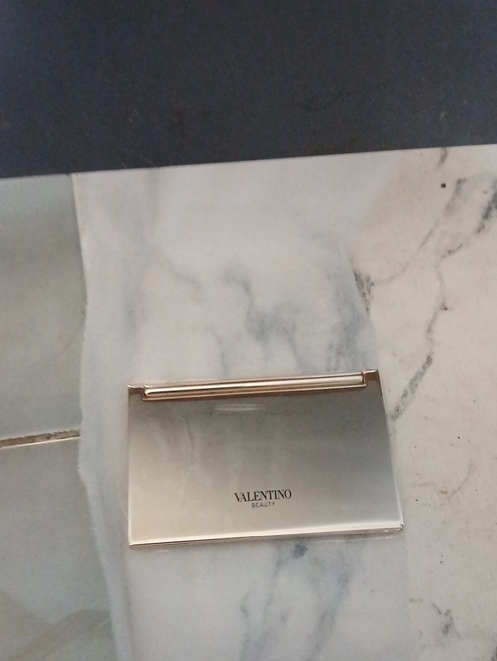 Valentino Metallic Silver Mirror Case with Gold Accent